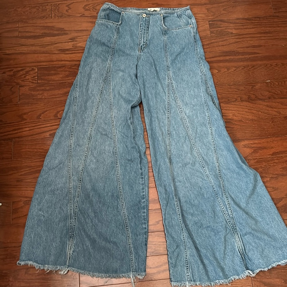 We the Free wide leg jeans with raw bottom edge.